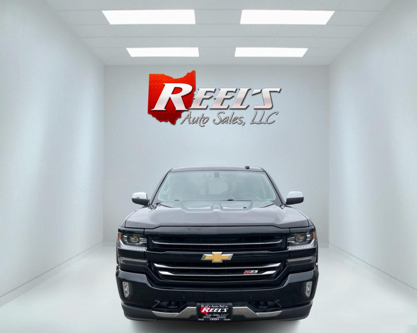 2018 Black /Black Chevrolet Silverado 1500 LTZ Z71 Crew Cab 4WD (3GCUKSEC4JG) with an 5.3L V8 OHV 16V engine, 8-Speed Automatic transmission, located at 547 E. Main St., Orwell, OH, 44076, (440) 437-5893, 41.535435, -80.847855 - This 2018 Chevrolet Silverado 1500 LTZ Z71 Crew Cab is a well-appointed and highly capable full-size pickup. It's powered by a 5.3L Vortec V8 engine paired with an 8-speed automatic transmission and 3.42 gearing, enabling an impressive 9,300-pound towing capacity. The Z71 off-road package includes f - Photo#1